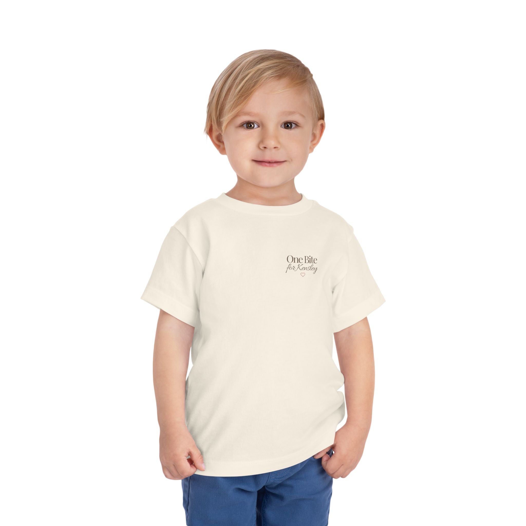 Toddler Tee — "Every Bite Tells Her Story" Personalized Feeding Milestone Shirt