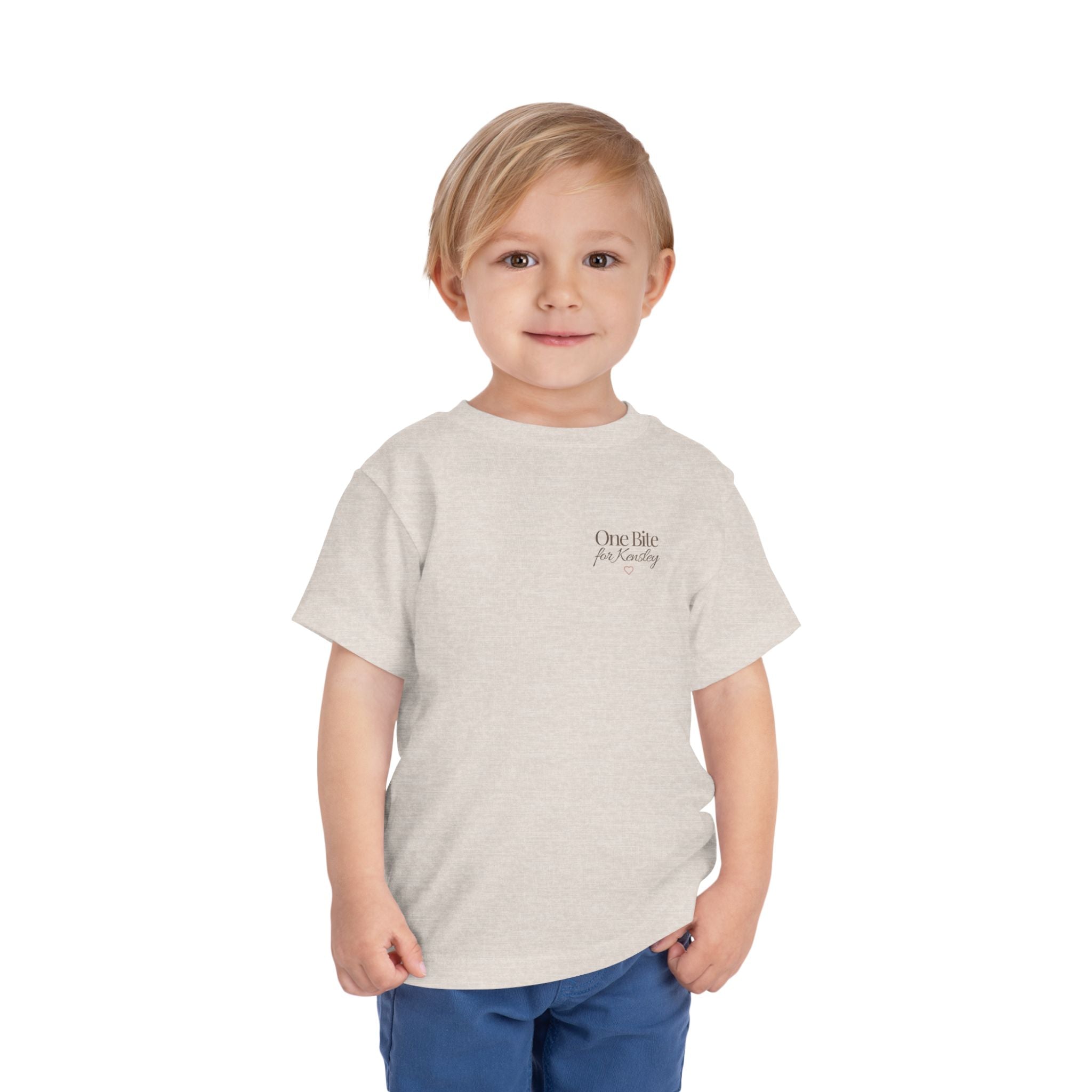 Toddler Tee — "Every Bite Tells Her Story" Personalized Feeding Milestone Shirt
